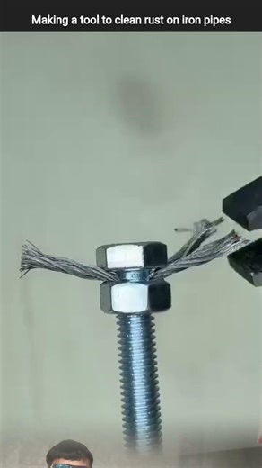 Making a tool to clean rust on iron pipes