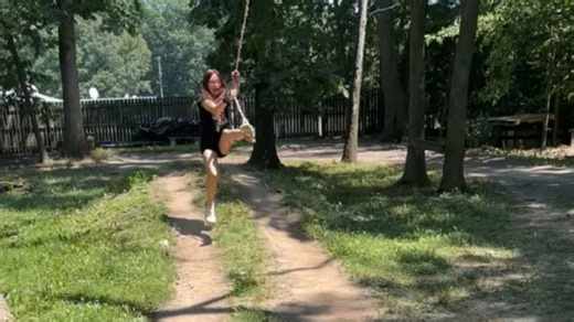Backyard rope swing adventure turns into hilarious fall as girl brings rope down with her