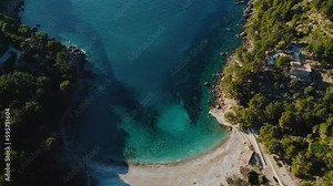 Scenic Palma de Mallorca Island, Cala Tuent near Sa Calobra. Natural idyllic turquoise blue clear sea water, sandy beach seaside cliff coast. Spanish Balearic Majorca, cinematic aerial drone 4K UHD