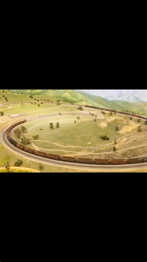 There is something timeless about watching a train wind its way around the Tehachapi Loop—an experience that never truly ends. Whether you’re standing high above the prototype itself or visiting us at the San Diego Model Railroad Museum, the feeling is the same: a quiet awe, a shared joy. It’s the reward of devotion—of countless hours spent honoring a real place, a real railroad, and a story that continues to move, one lap at a time. | La Mesa Model Railroad Club - LMMRRC, Inc.