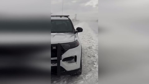 Blizzard batters vehicles on roads in Omaha, Nebraska