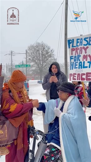 ❄ This morning on Day 92 - 1/25/2026, in the midst of our journey, a woman waited for the venerable monks. Despite the freezing cold, snow, and sleet, she was there—waiting. The venerable monks tied a peace bracelet for her and offered blessings. She was in tears of joy. In the harshest conditions, peace still finds a way. In the coldest moments, hearts still warm with compassion. In the most difficult circumstances, blessings still flow between souls. This is why we walk. For hearts that wait, 