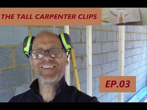 Cut and fixing noggins into a timber stud wall.