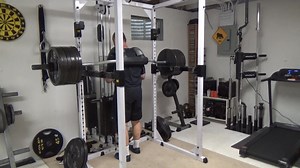 Loaded Carry Training - this is a 1 minute heavy support with 835 lbs to start, followed by a 3 minute in-rack loaded carry (sped up 10X). The heavy hold gets your connective tissue, muscle tissue and nervous system acclimated to supporting a very heavy load so that when you go to the loaded carry, even a fairly heavy load feels relatively lighter. The rest between the two sets was basically the time it took to take the weight off the bar. Then it was about 3-4 minutes rest in between rounds (re