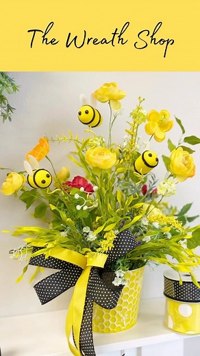 Bug week Part 2! A whimsical bumblebee spring floral arrangement! So bright and fun! Would you decorate with bumblebees? #springfloral #bumblebeedecor #beedecor #diyfloral #floralarrangement #wreathmaking #springgarden #diydecor #springdecor | The Wreath Shop