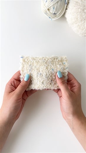 DROPS Design / Garnstudio on Instagram: "Get this fluffy and super cosy, white and blue combination, by working together DROPS Alpaca Bouclé 0100, off white and DROPS Fiesta 42, ice crystals ❄️ Our knitted sample has a knitting tension of about 14 stitches = 10 cm using 6 mm needles, which is a perfect fit for patterns in knitting tension group 15 - 14 stitches. Read more about this yarn combination and find free patterns that you can make with it by following the link in bio. #dropsalpacaboucle