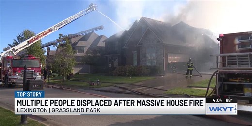 Crews battle massive house fire in Lexington