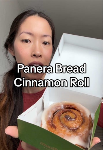 Enjoying a Warm Cinnamon Roll from Panera Bread