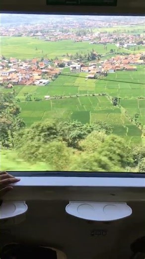 the natural beauty of West Java can be seen from the train cabin