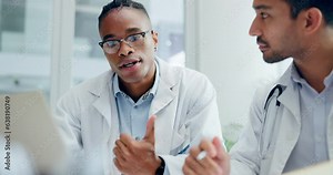 Hospital, meeting and doctors on laptop for telehealth, surgery treatment and diagnosis. Healthcare, teamwork and men talk in clinic office on computer for medical research, consulting and advice