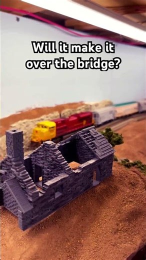 Model Train Attacks a Bridge on Grade
