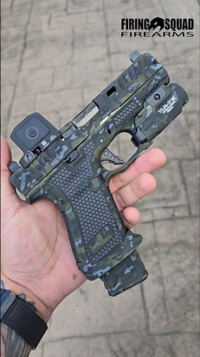 Gen 5 Glock 19 customized by Firing Squad Firearms. Trijicon RCR, night multicam cerakote, stippling