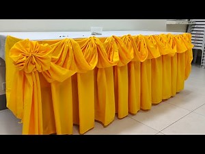 Box pleats with butterfly design scallop design and flower fold design table skirting tutorial