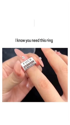 universe_decode on Instagram: "The post showcases a rotating video of a silver middle-finger ring engraved with 'FUCK', captioned 'I know you need this ring', tapping into viral meme humour about unfiltered expression. Shared by art and meme enthusiast @BiancoDavinci on 14 December 2025, it exploded to 5,577 likes and 776,000 views within a day, driven by shares among users seeking cheeky accessories. Thread replies feature Amazon purchase links and quips like 'mood ring 2.0', illustrating the r