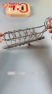 Mysterious #Chinese nine linked rings #puzzle The “Nine Linked Rings” puzzle may be one of China's greatest #mechanical puzzles. It consists of a long loop with a handle at one end connected to nine rings. The goal is to unlink the long loop from all nine rings, a process that involves hundreds of steps and requires a great deal of patience. | T-Time HK