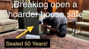A safe locked since 1970 is opened inside an abandoned hoarder home