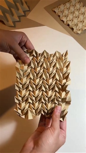 Not paper… structure.she turns a single sheet into geometric. #PaperArt #art