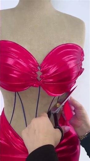 To order this red dress DM A bold statement gown crafted in a sculpted, body-contouring silhouette