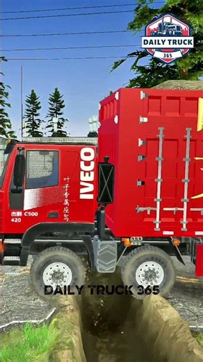 Loaded Logging Truck Pulls a Log Trailer Across a Deep Trench!