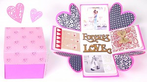 Hi everyone! In this video learn how to make a DIY Exploding Box for your boyfriend, girlfriend, best friend, family member, or even yourself. This handmade explosion box tutorial goes over the basic box base and lid formation so it's easy enough for beginners. It shows how to easily decorate as well, including hearts, photos, flaps, and a mini envelope. This is the perfect gift for Valentine's Day, Birthdays, Christmas, an anniversary, a moving or going away present, or just to show someone how