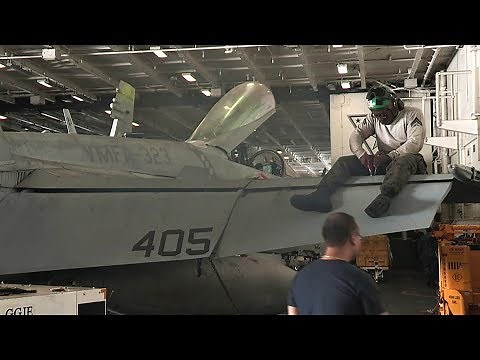 F/A-18 Hornet Maintenance Aboard Aircraft Carrier USS Nimitz
