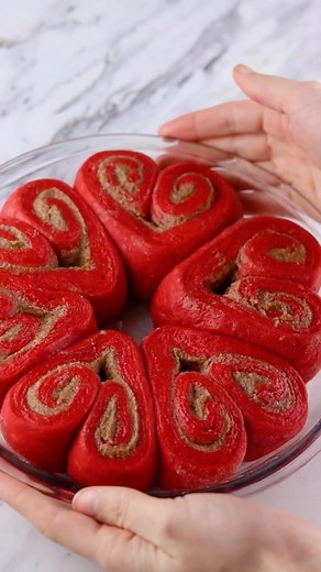 Red Velvet Cinnamon Rolls ❤️✨ This was my first time trying red velvet cinnamon rolls and I was pleasantly surprised at how amazing they were! I used @foodnetwork ‘s recipe and they are probably the softest/most fluffy rolls I’ve ever tried! So yummy! 😍 I shaped them into hearts and added pink frosting for a Valentine’s theme. #cinnamonrolls #cinnamonrolls #redvelvet #baking #bake #bakingfun #food #dessert #holidaybaking #cake #valentines #brunch #breakfastideas #easybaking | Sheri Wilson