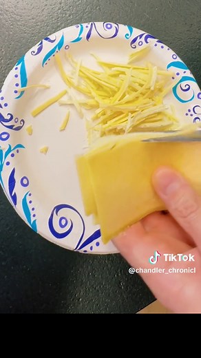🧀 Cheese Hack Alert! 🧀 In just 12 seconds, learn how to turn ordinary cheese slices into perfectly shredded cheese. Forgot to buy shredded cheese? No problem! Watch now and shred like a pro. #cheese#CheeseHack#KitchenTips #easyhack#cookingtiktok #foodtiktok#tutorial#hacksoflife