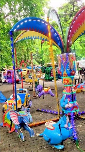 🎉🌈 Mini carousel chaos these cute rides got me spinning ❤️ #shorts #trending