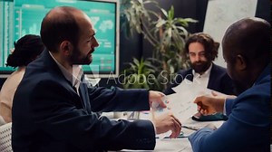 Marketing team working on corporate branding and reputation management strategies, finding ways to build and maintain a positive public image. Employees developing global business. Camera B.