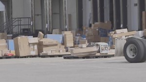Dozens of packages sitting outside FedEx facility in Hampton means customers are waiting... and waiting