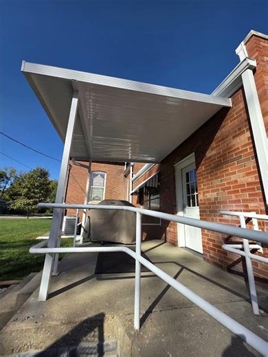 This Patio Cover Keeps Weather Out Year-Round