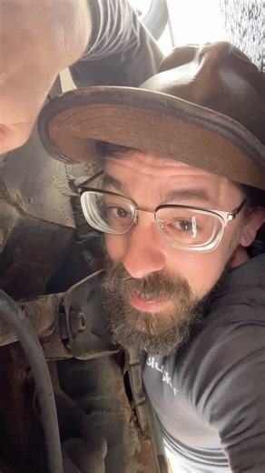 Fix a car with a coat hanger