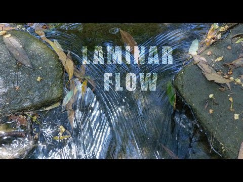 Amazing crossover laminar flow (?) of water in a natural creek
