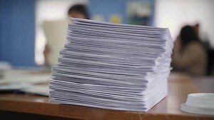 Stack of documents on the desk