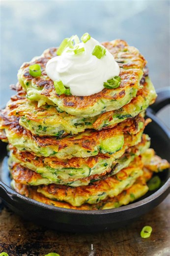 27K views · 351 reactions | This Zucchini Fritters Recipe is oh-so-easy and you’ll get perfectly crispy fritters every time. Recipe: https://natashaskitchen.com/zucchini-fritters-video/ | NatashasKitchen.com | Facebook