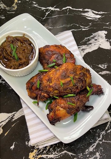 There’s more to chicken than just fried and peppered chicken my darlings. This JERK CHICKEN RECIPE can attest to that. The outcome is a soft and almost melt-in-your mouth chicken. You should give it a try and let me know what you think. INGREDIENTS * Spring onions * Ginger & garlic * Red scotch bonnets & habenero pepper * Onions * Thyme ( fresh one is perfect) * 2 tbsp Brown sugar * 2 tsp cloves & grated nutmeg * 1 tbsp white pepper ( use black pepper if you have ) * 1 tbsp all purpose seasoning