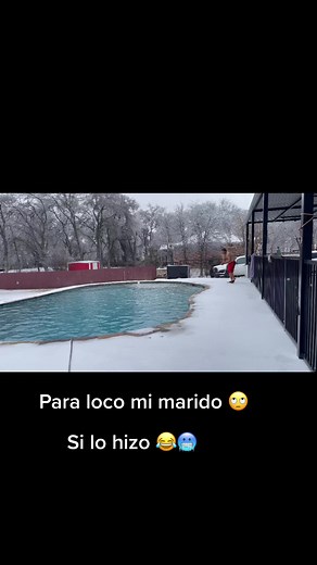 Winter Pool Jump: A Bold Snowy Splash