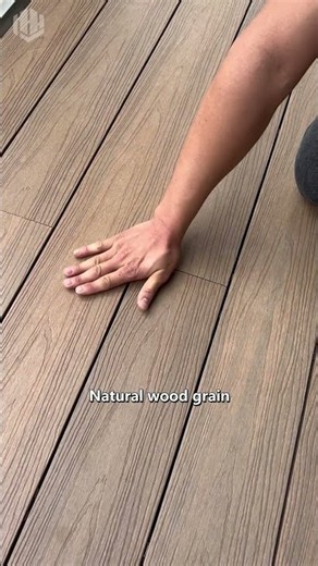 Waterproof and durable decking with a natural wood grain texture.