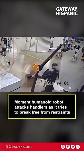 Moment humanoid robot attacks handlers as it tries to break free from restraints