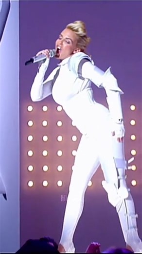 Kylie world page on Instagram: "Imagine 'Can't Get You Out of My Head' with anyone else... can't, right? 🎧🎤🎶 Kylie Minogue owning the stage on her show in 2007 is a sight to behold! This 2001 hit, produced by Cathy Dennis and Rob Davis, was first offered to S Club 7 and Sophie Ellis-Bextor, but Kylie brought it to life. Sophie's record company must have had other plans, but we're glad it worked out for Kylie ❤ Credit pollofarsante for the video on tick tock 📽❤"