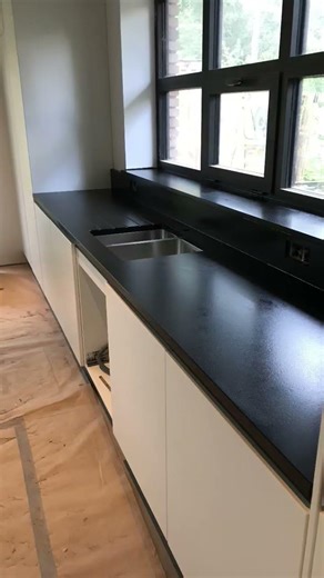 black granite countertop and window tablets