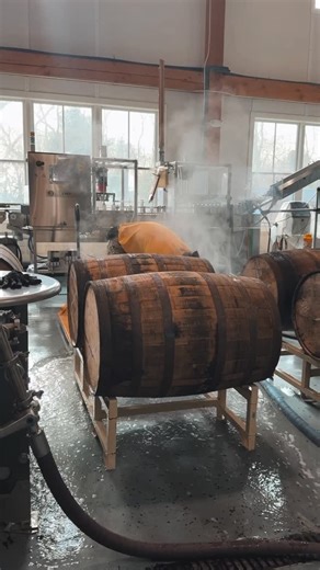 The brewery smells like a dream today. Warm oak, bourbon ghosts, and rising steam. Freshly dumped barrels get a quick cleanse, then our fresh Boreal flows in while they’re still humming with their past life. Now they rest. Almost a year of quiet transformation, soaking up smoke, sweetness, and deep bourbon warmth. | Tilted Barn Brewery