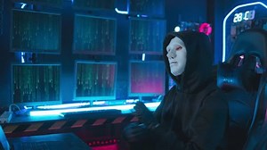 Asian female hacker With a mask covering face remains anonymous hoodie while executing digital espionage and cyber attacks. network security, information technology, data protection concept