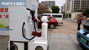 62K views · 263 reactions | A smart mobile charging robot with a charging power of up to 40 kilowatts is seen approaching to charge a new energy vehicle in Jinhua, east China's Zhejiang Province. #LifeInChina | People's Daily, China | Facebook
