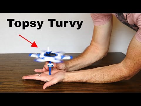 Why Does A Spinning Top Lift Itself Up?