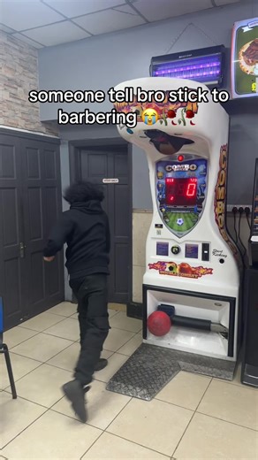 Unexpected Boxer Fails at Punch Machine