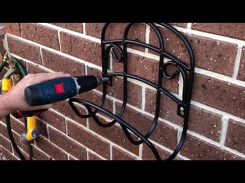 How to Mount a Hose hanger or anything really onto a Brick Wall. Strong easy mounting to Brick