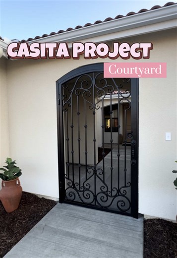 Replying to @Michelle | Plus Size Mom Courtyard Gate install finally happened!! We’re so excited for the indoor/outdoor living to come with a private open air courtyard, it’s always been a dream of mine watching novelas in haciendas to have a courtyard🥹 it’s not much to give a “tour” of but once we get some more pieces and living into it I’ll share! . . . #courtyard #spanishstyle #casita #casatiktok #nuestrohogar