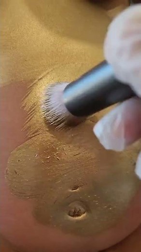 Getting Painted in Gold for Underwater Maternity Photoshoot in LA