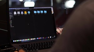 Download Person operating a computer